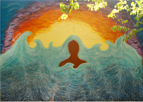 figure in waves with a sunset behind