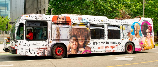 TTC Pride Bus driving on city street