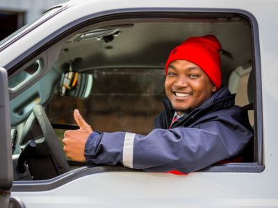 TTC driver in cab of Wheel Trans vehicle