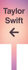 Purple/orange paddle with the words Taylor Swift and a left pointing arrow