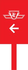 Red paddle with a TTC logo and a left pointing arrow
