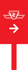 Red paddle with a TTC logo and a right pointing arrow