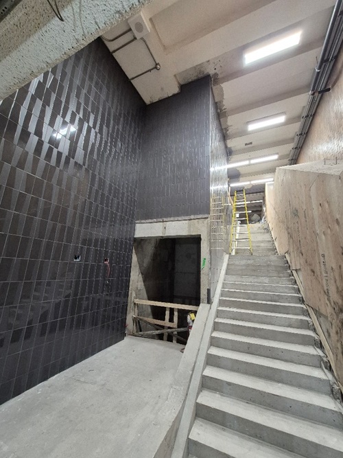 Photo 2: Phase 2 (Elevator 1) elevator shaft and widened staircase under construction inside the Station for the northbound platform