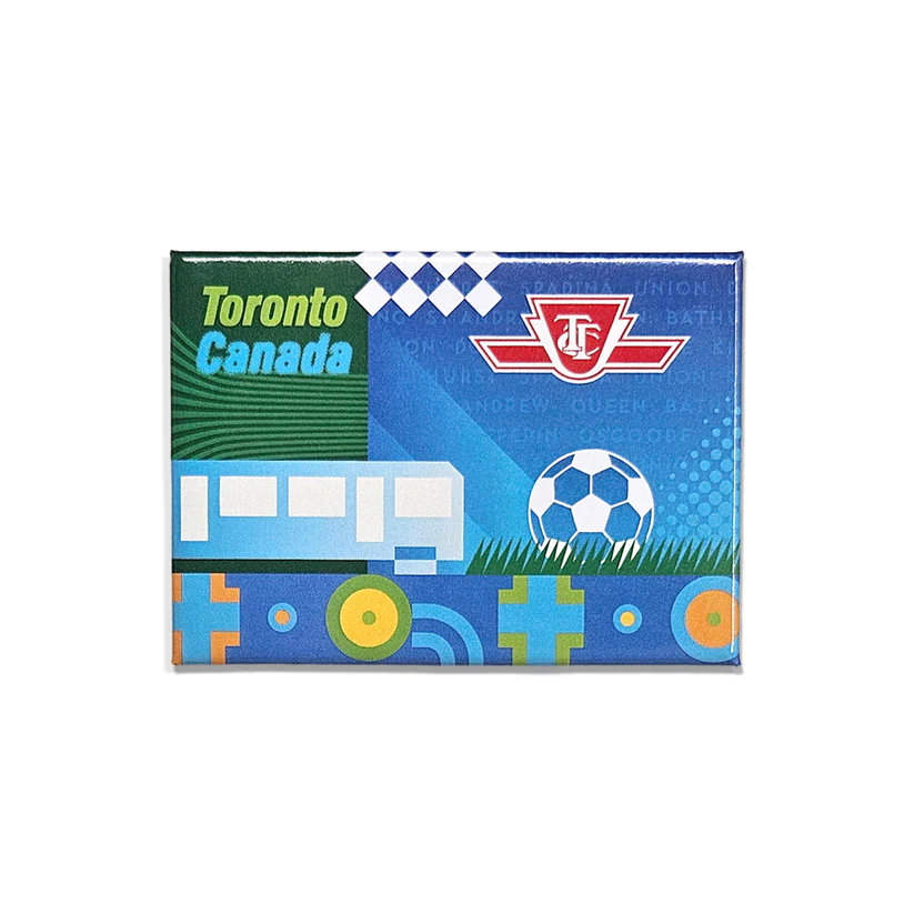 A colourful TTC magnet with the text "Toronto Canada" and graphics including a TTC streetcar, a soccer ball and a red and white TTC logo