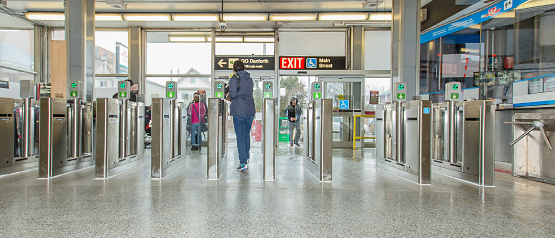 Passenger exiting station through new Presto fare gates