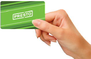 A hand holding a green PRESTO card from its bottom right corner.