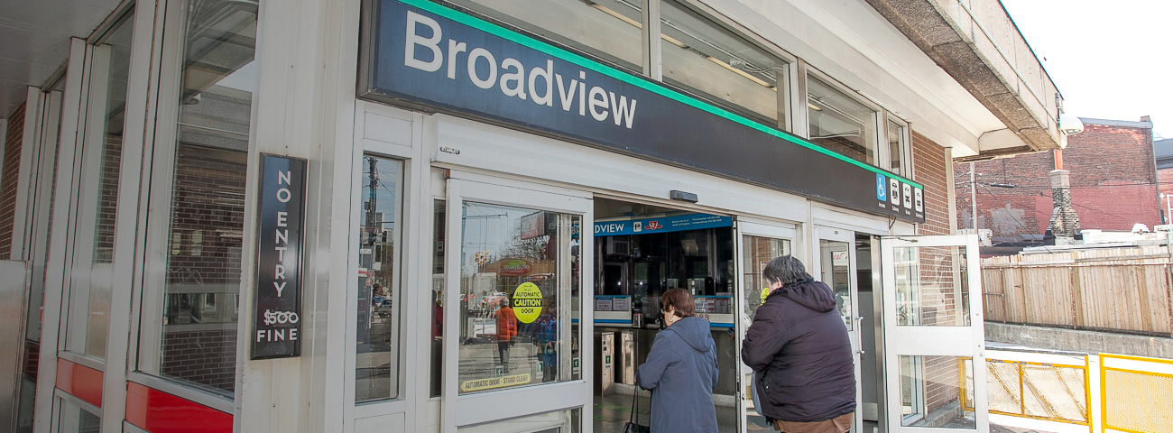 People walking toward Broadview Station Entrance